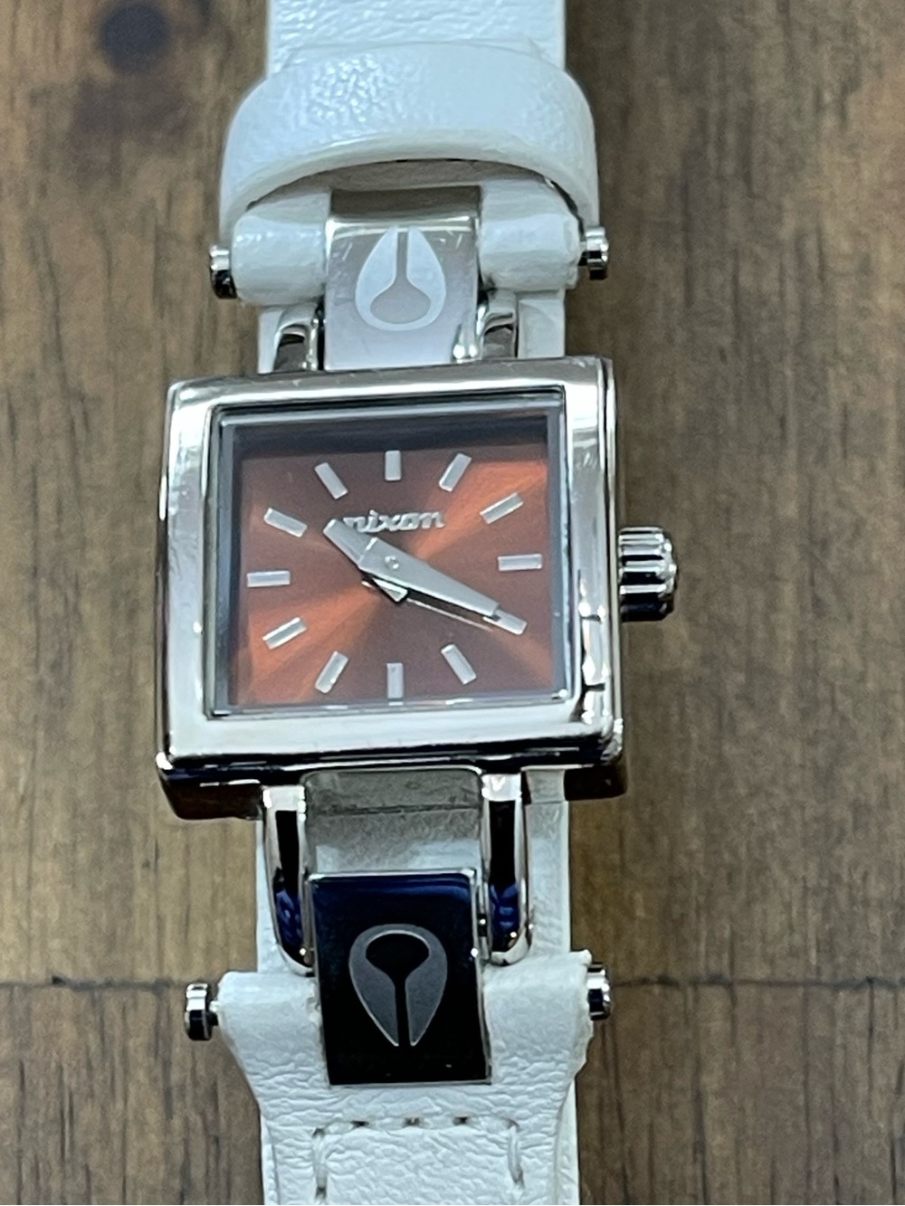 Nixon Matchmaker Women’s Square Watch with Metallic Orange Dial and White Strap